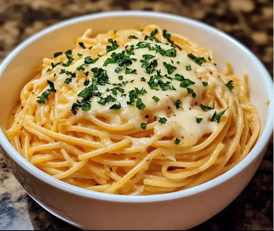 Delicious cheesy pasta dishes including garlic parmesan and cream cheese spaghetti