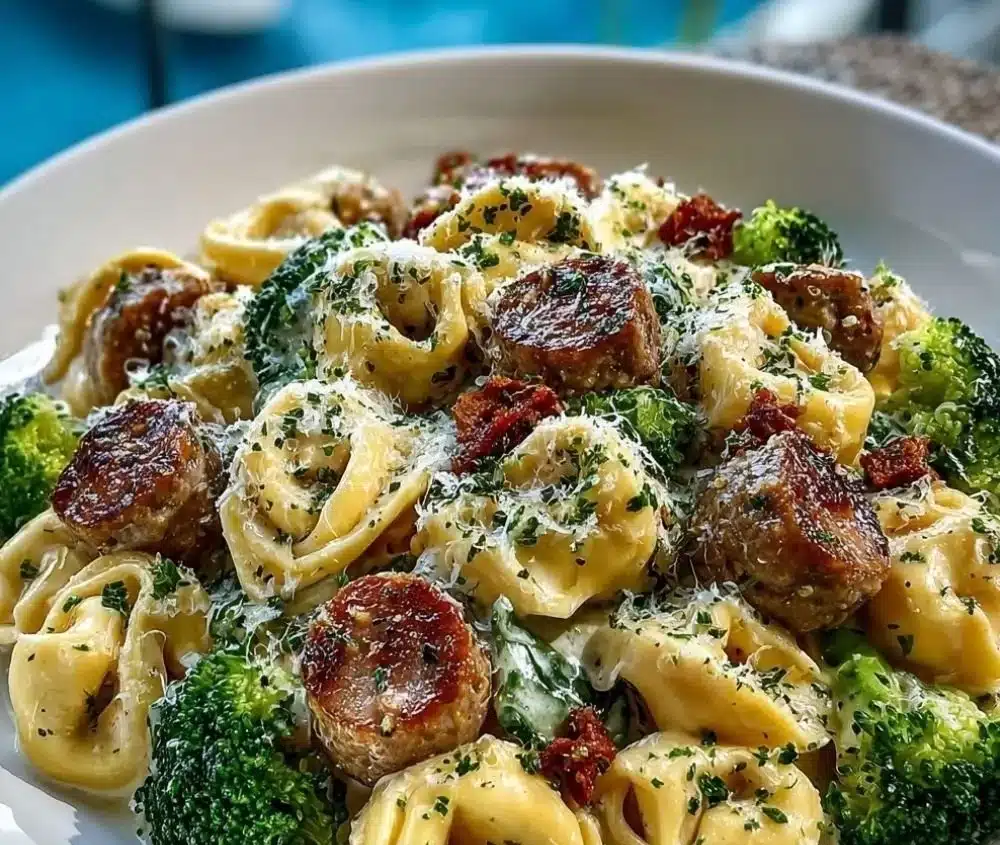 Delicious Garlic Parmesan Tortellini with Sausage and Broccoli in a creamy sauce