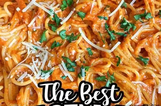 Plate of Roasted Red Pepper Pasta with fresh basil and parmesan cheese.